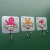 Stainless steel crystal glue large hook, creative no-drilling large curved hook, bathroom large adhesive hook, strong and traceless object placement adhesive hook Application Scenario